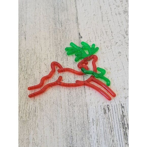 Green red plastic jumping reindeer ornament Xmas decor - Picture 1 of 6